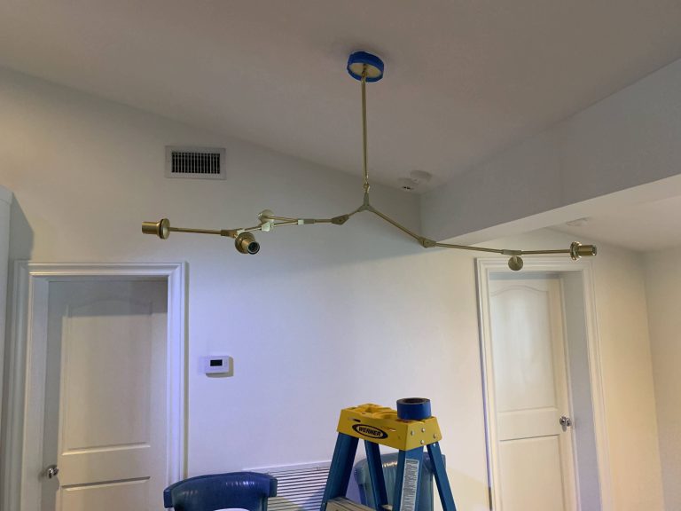 installad ceiling light with ladder